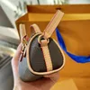 24SS Women's Luxury Designer Mini Portable Pillow Bag Pendant Women's Chain Bag Zipper Coin Purse Earphone Bag Mouth Red Envelope Key Bag Chain Detachable 10CM