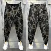 Spodnie moda ulica Hiphop Floral Pants luz luz haremowe spodnie najnowsze wysokiej jakości luksusowa marka odzież męska