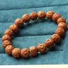 Strand Golden Monkey Head Peach Pit de artesanato esculpido Bracelet de contas de semente de semente original