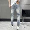 Jeans masculin printemps d'été mince ajicon hommes droits en liberté en ligne européen américain cdicon marque haut de gamme petit pantalon droit lxk30