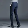 Calça masculina BOTON BOLUTO BULTERY BONES Bolsos zíper de retalhos de retalhos de moda casual solta calças profissionais retas