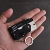 Verktyg Mini Folding Rubber Band Gun With Key Chain Ring Six Bursts Made Metal Guns Shooting Toy For Kids Gifts Outdoor Fun Sports Tools Tools