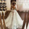 Ny mode Deep V Neck 3D Flower Spets Wedding Dress Sexig Se genom illusion Bröllopsklänningar för brud Princess Bridal bröllopsklänning med ärmar