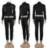 Designer di pantaloni a due pezzi femminile J2944 Sport d'autunno/inverno Nuovo semplice set di stampa per pendolari in bianco e nero 0jiu