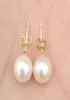 Real Pearl Nous vendons seulement de la vraie perle belle une paire de 910 mm de boucle d'oreille en perles blancs de mer du Sud359923 de 910 mm