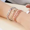 Clusterringe 2 in 1 Magie Retrakable Ringarmband Kreative Dehnungsverdrehung glänzender Strassarmbänder für Frauen Schmuck Geschenk