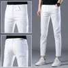 Heren jeans heren modemerk elastische slank fit denim lange broek casual witte rechte been y2k jeans voor heren streetwear 240423