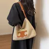 Bolsas de designer de Cellin Senior para mulheres, estilo de férias, tecido grande para mulheres novas bolsas de grama na moda de praia com logotipo original com logotipo original