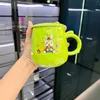 Tassen hoher Schönheit warmer Tasse 55 Grad Handgeschenk Keramik -Cartoon mit Deckellöffel große Kapazität Konstante Temperatur festgelegt