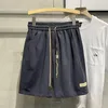 Herr shorts sommar high street personlig arbetskläder mode lös bekväm rak utomhus avslappnad fempunkt byxor manliga kläder