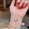 Cheap price and highquality jewelry High Clover Flower Bracelet Pure Silver Plated with Gold Stone Red Agate with original vanley