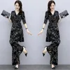 Costume pour femmes décontracté d'été deux pièces modes large jambe longue longue pantalon half manche haut de gamme de bureaux imprimés de style coréen 240418