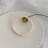 Brin 7 à 8 mm blanc près de rond les perles d'eau douce naturelles bracelet simple femelle élastique fait à la main gift fempère des femmes