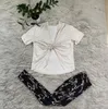 Kobiety Backless Sexy Sets Summer Shift O-Neck TEE TEE TEE+Spodnie Dwukierunowy zestaw Tracksuits Lose Women Jogging Suit