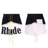 Trendy Rhude Letter Color Blocking Casual Sports Elastic Shorts for Men and Women's American High Street Beach Pants