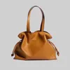 Niche 2024 Design Large Capacity Single Shoulder Bag with Solid Color Drawstring Cuffs Underarm Cowhide Lucky Womens