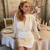 Party Dresses 18072#Elegant White V-hals Wrap Buttocks Kort klänning utsökta halsringningar steg långärmad öppen back mini kväll