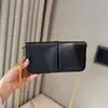 Klasyczna oryginalna skórzana torebka sprzęgła ze Złotym Złotym Załączką Torba Luksusowa marka Cowhide Portfelopa Zestaw Zestaw Fashion Cross Body Body Torka