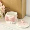 Épargnes alimentaires Conteneurs de rangement créatif Bow Ceramic Pearl Jewelry Box mignon peint de bureau peint pavillon cadeau fille cosmétique peut décoration de maison nouveau H240425