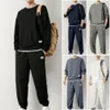 Casual Sports Suit Mens Sport avec Waffle Texture Sweat-shirt Pantalon Jogger Set pour les hommes de style jeunesse d'hiver d'hiver 240411