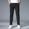 Lente zomer casual broek mannen dun een stretch slanke fit elastische taille business klassiek Koreaanse broek mannelijk kaki grijs 38 240423