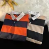 2023 Autumn Mens LongSleeved randig lapel polo skjorta harajuku stil lös tshirt män och kvinnor par märke toppar 240418