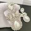 Frauen Designer Luxusohrringe Weiß Gold plattiert Bling cz Kristall Bug Ohrringe Clips für Mädchen Frauen für die Hochzeits Hochzeit Schönes Geschenk