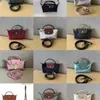 2024 El çantası Gezerek Toptan ve Çanta Kalp Çanta Çanta Fransız Lüks Crossbody İlkbahar Yaz Borse Cowhide Sac Luxe Femme Mini Kadın Demplings
