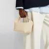 Radväskan är en nischdesign 2024 för avancerade texturerade lunchlådor hinkväskor för kvinnor äkta läderbärande väskor för kvinnor x4vj