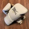 Beschermende uitrusting Bokshandschoenen voor mannen en vrouwen Sanda Training Thai Boxing en Professional Sandbag Fist Sets 240424