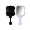 Spiegels plastic spiegel retro vlinder snijwerkspiegel spiegel kleine geschenkgreep make -up spiegel 12,5*5,5 cm