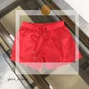 Projektantki szorty męskie damskie odzież kąpielowa Krótka luksusowa wodoodporna haftowana etykieta Szybkie suszenie z siatkową oddychającą sportową sportową spodnie Summer 782