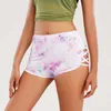 Shorts Shorts Tie Dye Stampa laterale Criss Cross Yoga High Waist Out Sports for Women