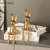 1pcs Céramique Temps allongé Assis Room de lapin ornements Statue de luxe Accessoires de décoration de maison Highend Art Aesthetics 240425