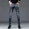 Diseñador de jeans para hombre Jeans Blue Men's moderno bordado de otoño e invierno Pantalones pequeños Pantalones largos Pantalones casuales versátiles para hombres xa5n