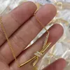 Lüks tiifeniy tasarımcı kolye kolyeler v altın kaliteli elmas düğüm kolyesi t ip dişi kaplama 1 0 Mi Kont kolye yaka kemiği zinciri