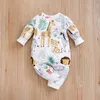 Rompers wiosna i jesienne chłopcy i dziewczęta Śliczne kreskówka Tropical Animal Aop Print Bodysuit z długim rękawem D240425