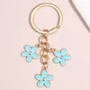 Keement keychain simpatico portachiavi colorati di fiore sakura catene dolci per donne accessori per borsetta per le borse di gioielli fai -da -te 240425 240425