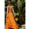 Lässige Kleider Bohemian Summer Kleid sexy offene Schnürung mit Quasten und Rüschen schneidet die Feste Farbe Frauenstil Long