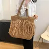 Drawstring Bohemian Tassel Hollow Tote Bag Designer Straw Woven Women Handväskor Sommarstrandsäckar Casual Bali axel