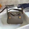 Handbag feminina L de alta definição Lindi bolsa mini camada de cabeça Togo Couro de um ombro Mensageiro de mão para mulheres Bolsa de doutor