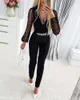 Kvinnors jumpsuits Rompers DP V-hals Mesh Long Svve Jumpsuit i ett stycke Womens Black Elegant Rhinestone Chain Sparkling Party Night Sexig Tight Fiting Suit Y240425