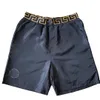 Shorts maschile designer maschile casual oversize estate marca alla moda per uomini pantaloni da spiaggia seta ghiacciata