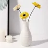 Wazony 1PC Nordic Plastic Wazon Prosta mała świeża butelka do przechowywania kwiatów do kwiatów salon nowoczesne dekoracje domu ozdoby