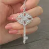 Luxury Tiifeniy Designer Pendant Colliers Automne et hiver Nouveau Love Key Pull Chaîne Light Fashion S925 Collier en argent Zircon synthétique essentiel pour les fées