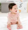 Rompers Baby Bodysuits Summer Soft Cotton Tassel Rompers Boys Girls Korte mouwen Solid Onepiece kleding Pasgeboren kleding 0-24m H240425