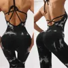 Women's Jumpsuits Rompers Sexy backless jumpsuit suitable for womens fitness push up hollow slimming fitness gym jumpsuit sports tight fitting suit Y240425