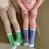 Pyjamas Kids Pyjama Cotton Sleepwear Lange mouw T -stukken en broek 2pcs Casual Boys Sleepsuit Girls Kleding H240425