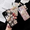 Obudowy telefonu komórkowego Luksusowy wisiorek Pearl Rhinestone Telefon dla Samsung Galaxy S23 S22 S21 S20 Ultra 5G S9 Plus Note10 Bling Diamond Flower Case 240423