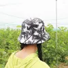 Bérets Fashion Imprimé femmes Caps pêcheurs à double face porte Voyage Beach UV Protection Chapeaux de protection pliable